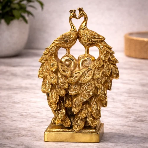 Brass peacocks with intricate feather