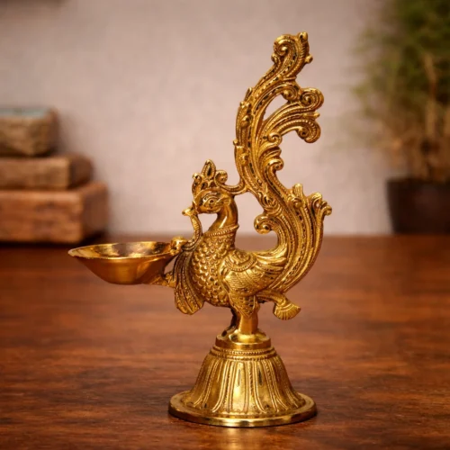 Ornate brass peacock oil lamp