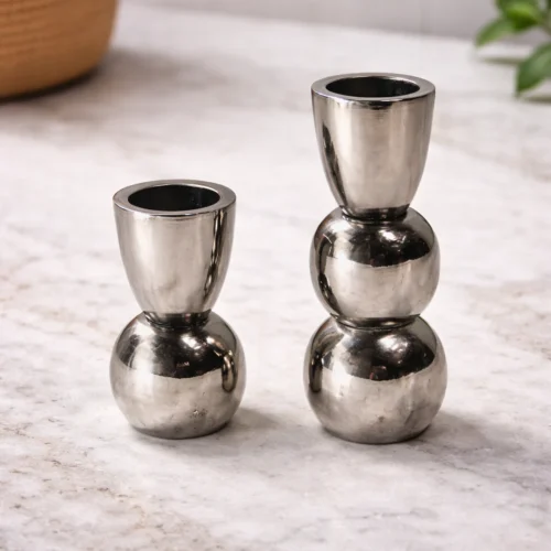 Polished aluminum candle holders