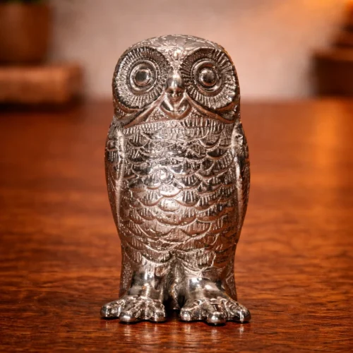 Polished silver owl